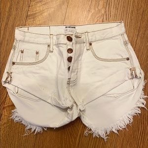 White denim cutoff shorts
